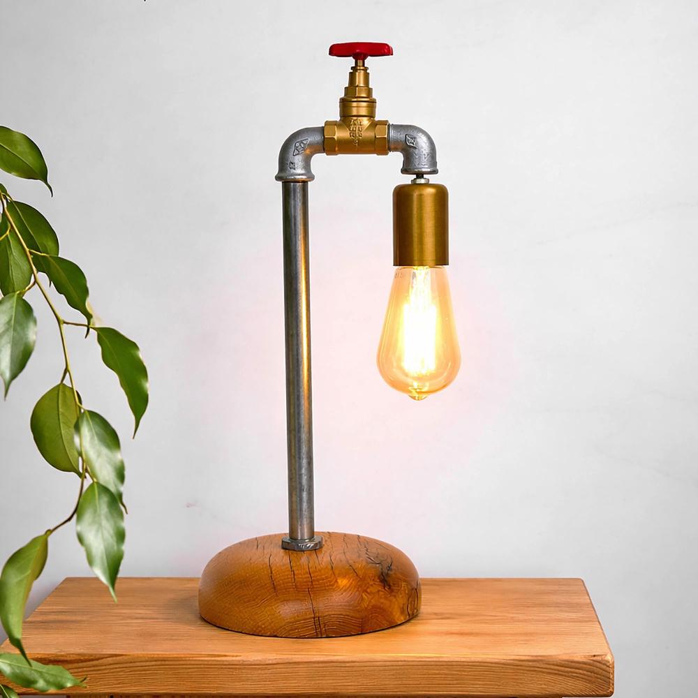 Faucet Glow Masa Lambası – Hasan Sezen Koleksiyonu, Premium Endüstriyel Dekoratif Tasarım Faucet Glow Musluk Masa Lambası – Endüstriyel Form ve Ahşap Tabanlı Koleksiyon Objesi